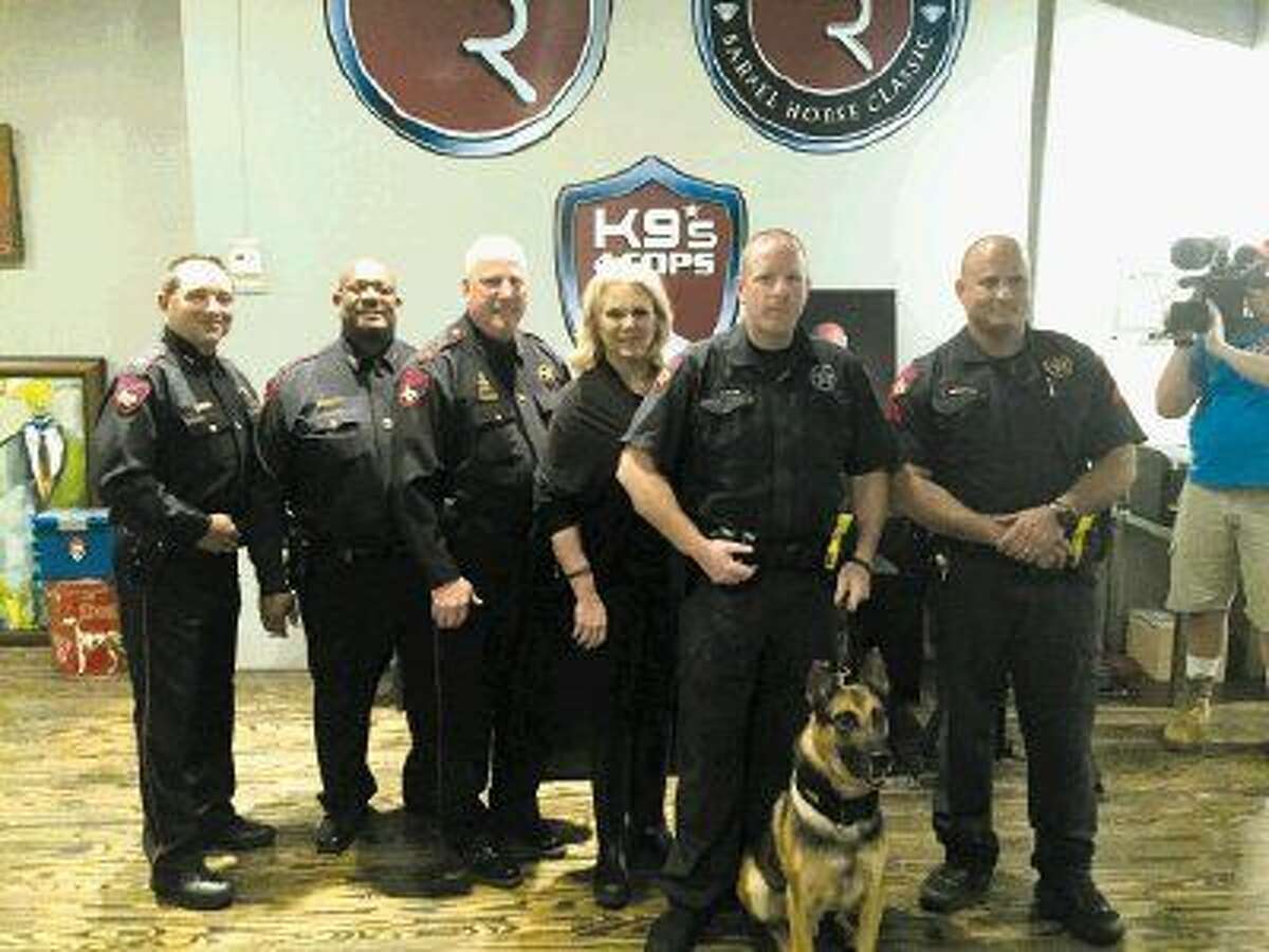 Deputy Kenneth Taylor and K-9 “ John” along with Kristi Schiller of K9s4cops and Constable Mark Herman and staff. his