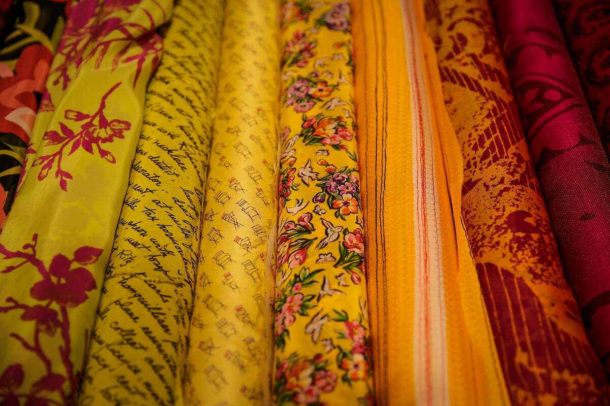 Britex Fabrics moving, but just to Post Street. And the red sign?