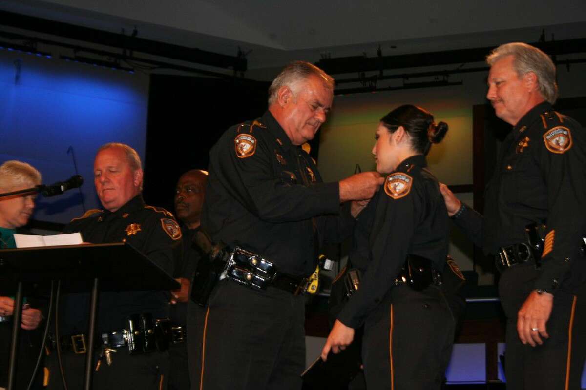 This momentous graduation was marked by a ceremony at Humble Area First Baptist Church Thursday, May 26, 2016, where a family member presented the class awards and pinned the badge on the now-deputies.