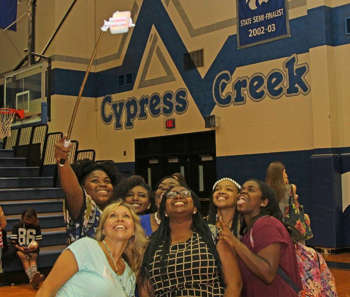 Cypress Creek’s young ladies pose for a selfie during the Girls in Pearls conference.