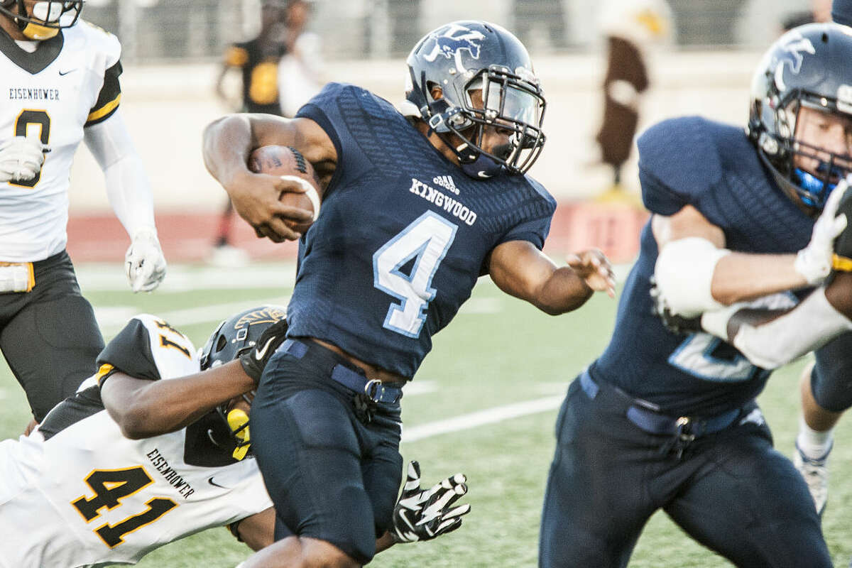 Kingwood's Damon Young (4) rushes through the defense during Kingwood's 20-12 victory over Aldine Eisenhower on Sep. 17, 2015, at Turner Stadium.