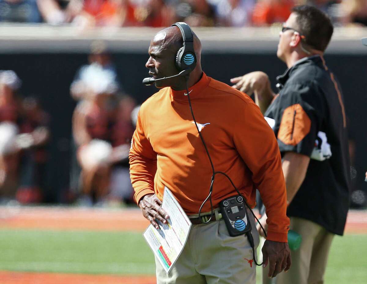 Texas head coach Charlie Strong is pictured during an NCAA college football game between Texas and Oklahoma State in Stillwater, Okla., Monday, Oct. 3, 2016. Oklahoma State won 49-31. (AP Photo/Sue Ogrocki)