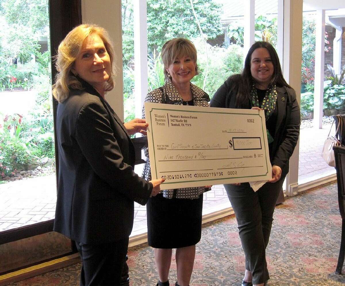 Mary Ryder (l) and Anissa Cordova (r) of Girl Scounts of San Jacinto recieve check from Mary Denney (c) of MLD Unlimited.
