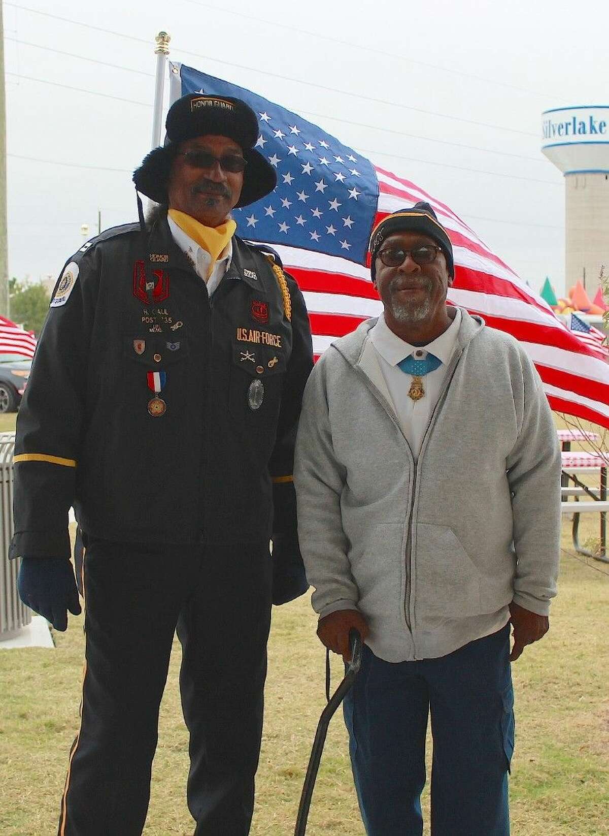 Company Man and Brazoria County Combined Honor Guard representative Harry Gaul with Clarence Sasser.
