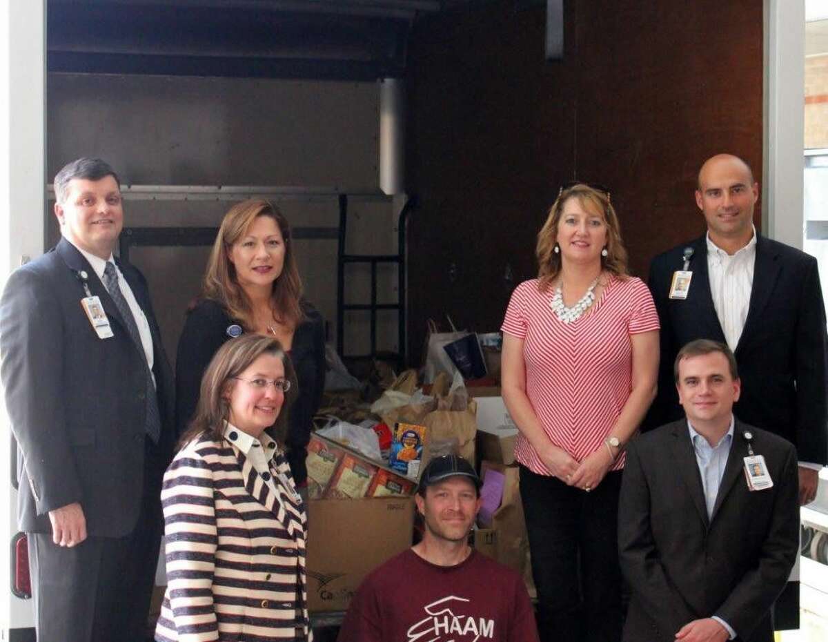 Memorial Hermann Northeast employees donate food, cash to help needy families