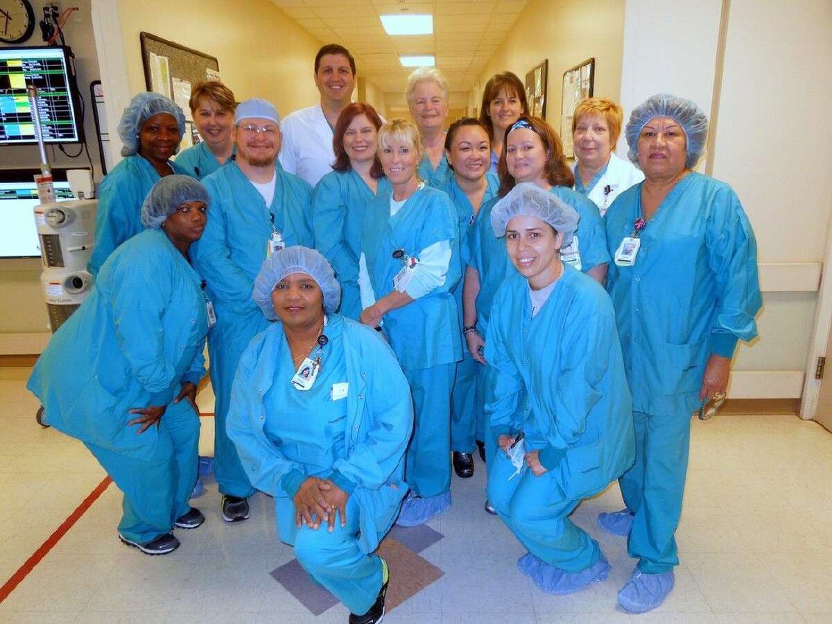Memorial Hermann Northeast Hospital was one of 52 participating hospitals nationwide to be recognized by the American College of Surgeons National Surgical Quality Improvement Program (ACS NSQIP) for achieving meritorious outcomes for surgical patient care. Pictured are members of the hospital’s post-anesthesia care unit (PACU). From left to right, first row kneeling: surgical technician Dorothy Robinson, anesthesia technician Joanna Savoy, Karen Balschun, RN surgery. Second row, clinical manager Stephen Davis, Jessica Makin, RN PACU, Rachel Kossoy, RN PACU, Kezia Tsui, RN PACU, PACU clinical coordinator Susie Moon, operating room attendant, Isabel Navarro. Back row: Cynthia Duncan, RN surgery, PACU clinical manager Sue Freeborg, affiliated colorectal surgeon Tal Raphaeli, M.D., Pam Parks, RN PACU, Karen Kolar, RN day surgery, and perioperative director Beth Martinez.