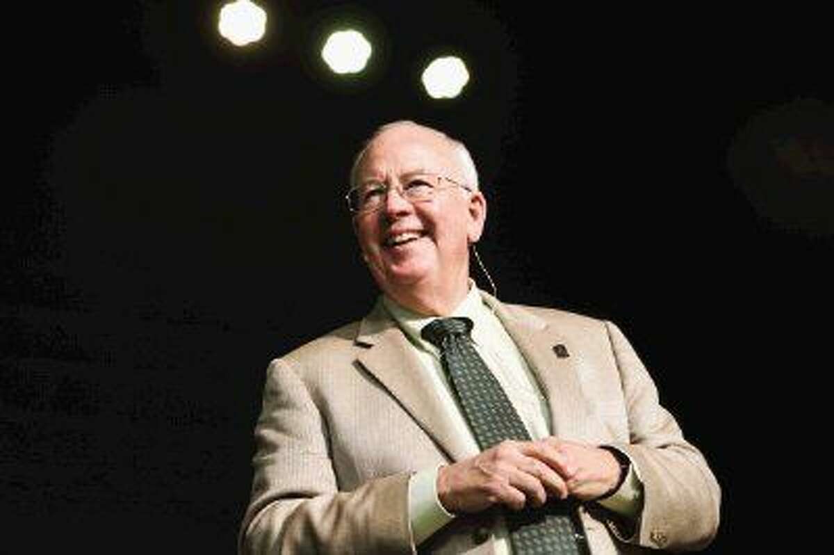 Judge Kenneth Starr, Baylor University President, speaks during the Men's Power Lunch series Monday at First Baptist Church in Conroe. Starr served as an independent counsel during the Whitewater investigation as well as the Clinton/Lewinsky scandal.