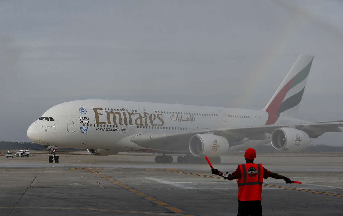 Emirates' inaugural A380 flight to George Bush Intercontinental Airport touches down on Wednesday, Dec. 3, 2014, in Houston. (Aaron M. Sprecher/AP Images for Emirates)