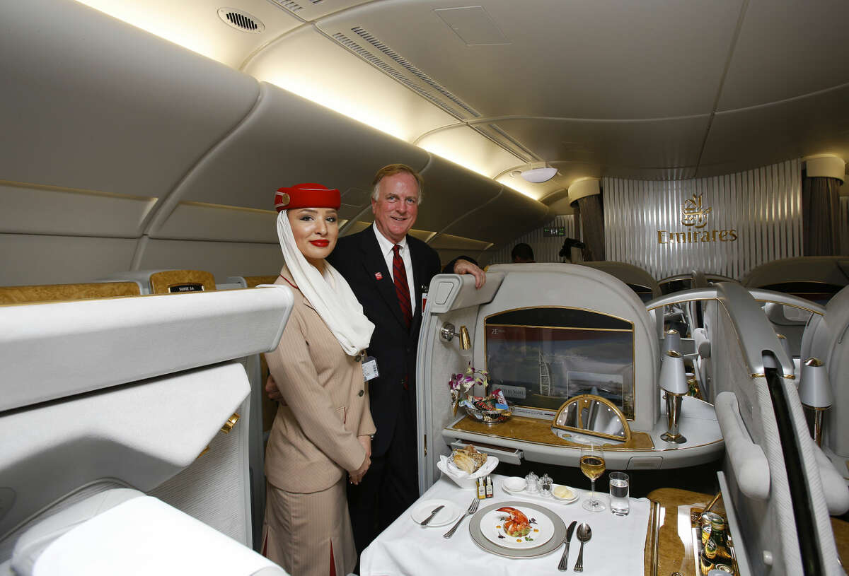 Emirates Regional Sales Director Central USA, Alexander Houston, right, tours the A380 with an Emirates’ cabin crew at George Bush Intercontinental Airport on Wednesday, Dec. 3, 2014, in Houston. (Aaron M. Sprecher/AP Images for Emirates)