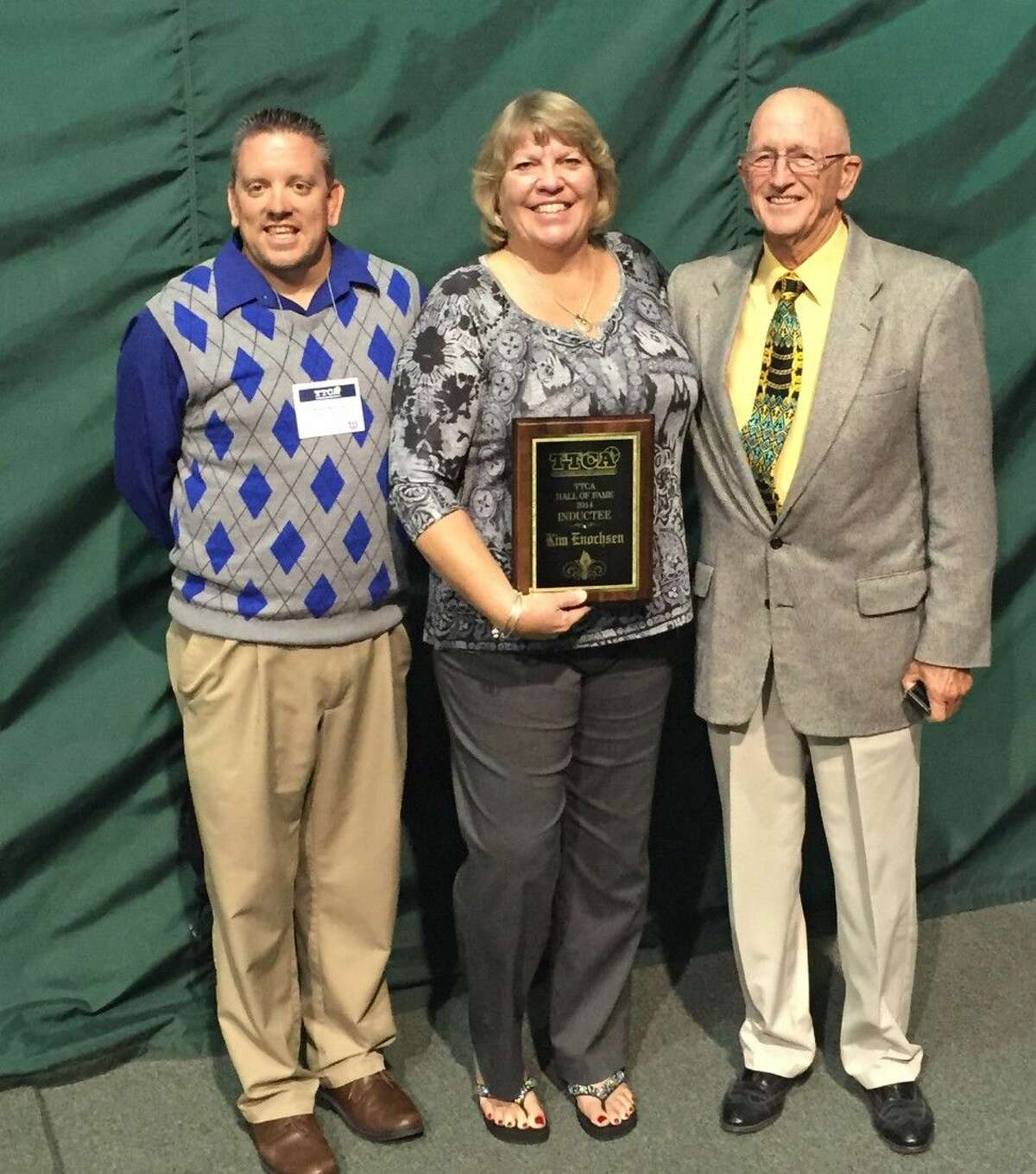 Texas Tennis Coaches Association Hall of Fame Induction. Pictured left to right, Kingwood High School Tennis Coach Kevin McElroy, Coach Kim Enocksen and Coach Jerry Franklin.