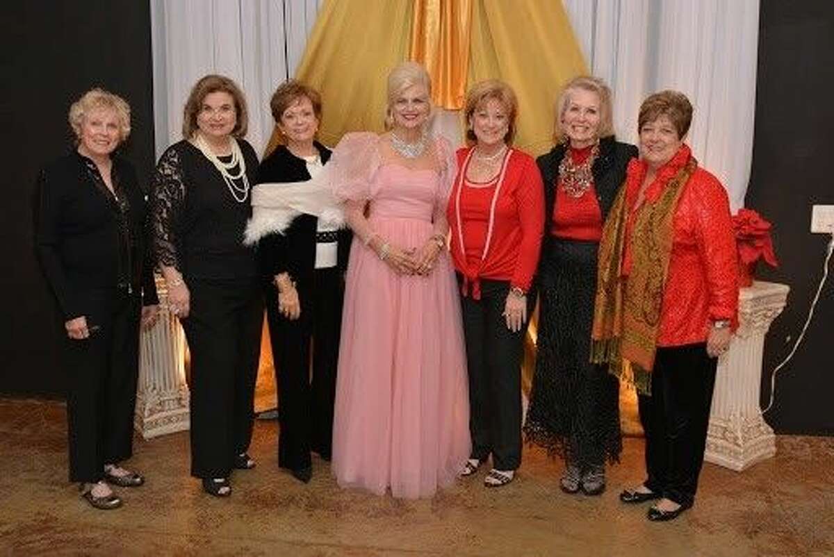 Fundraising Chair Diane Lipton and Co-Presidents Gina Wolford and Susan Cofran with members of the Guild.