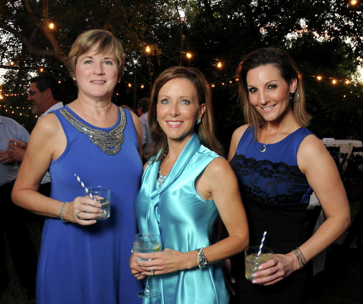 From left: Gail Talbot, Melissa Spinks and Danielle Redmon at the Bayou Preservation Association's "Blues on the Bayou" at the home of Colleen Holthouse Wednesday Oct. 05, 2016. (Dave Rossman Photo)