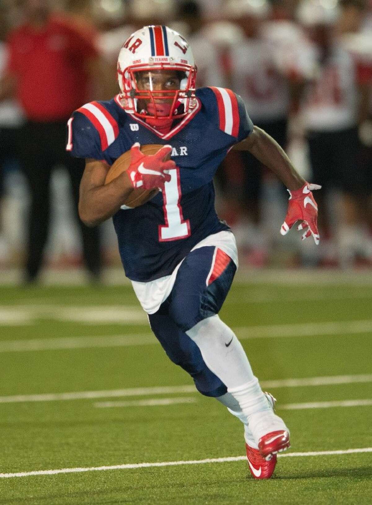 Lamar sophomore running back Ta’Zhawn Henry was named the District 20-6A Co-MVP Offensive Player of the Year along with Reagan running back Fred Cooper.