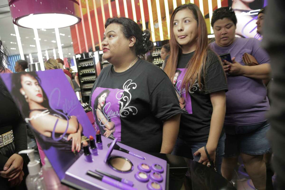 A shoppers check out the display for MAC's Selena Collection at the Galleria on Thursday, Oct. 6, 2016, in Houston. Stores were expecting to sell-out this morning.