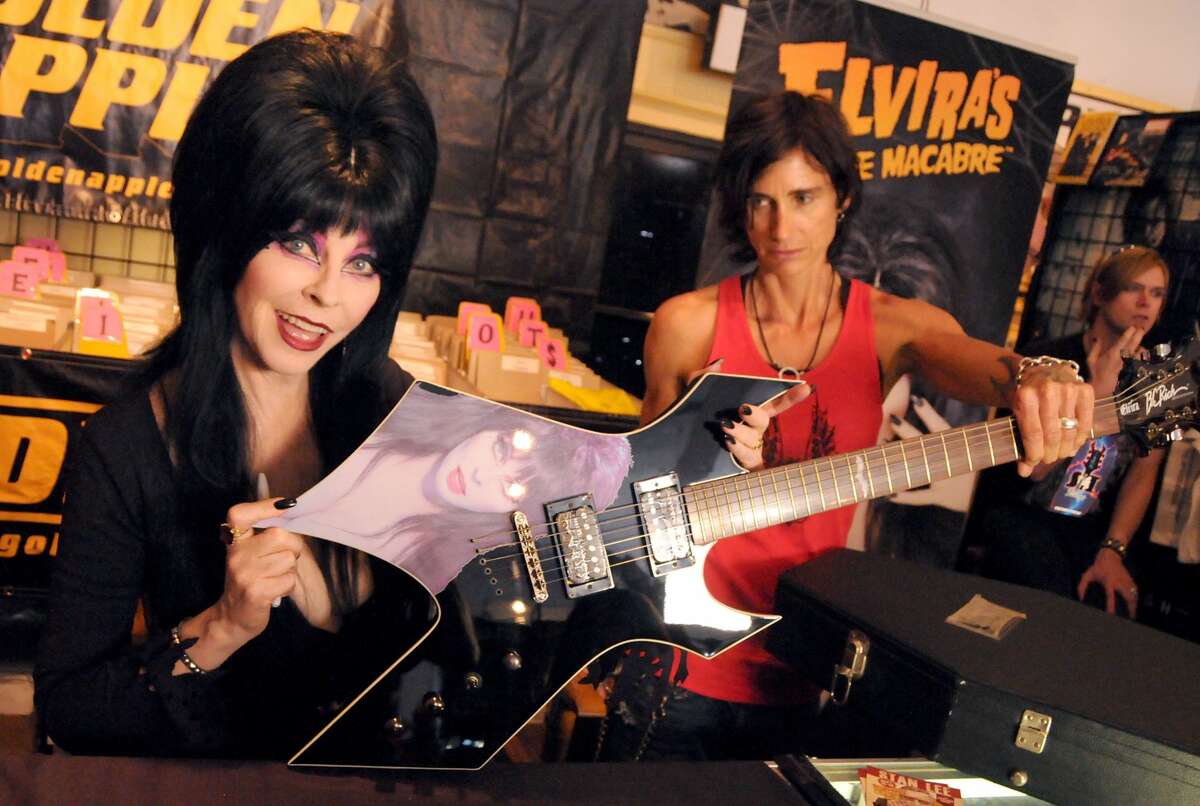 Spooky Spunky Elvira Celebrates 35 Years Of Business With A Coffin Table Book For Fans
