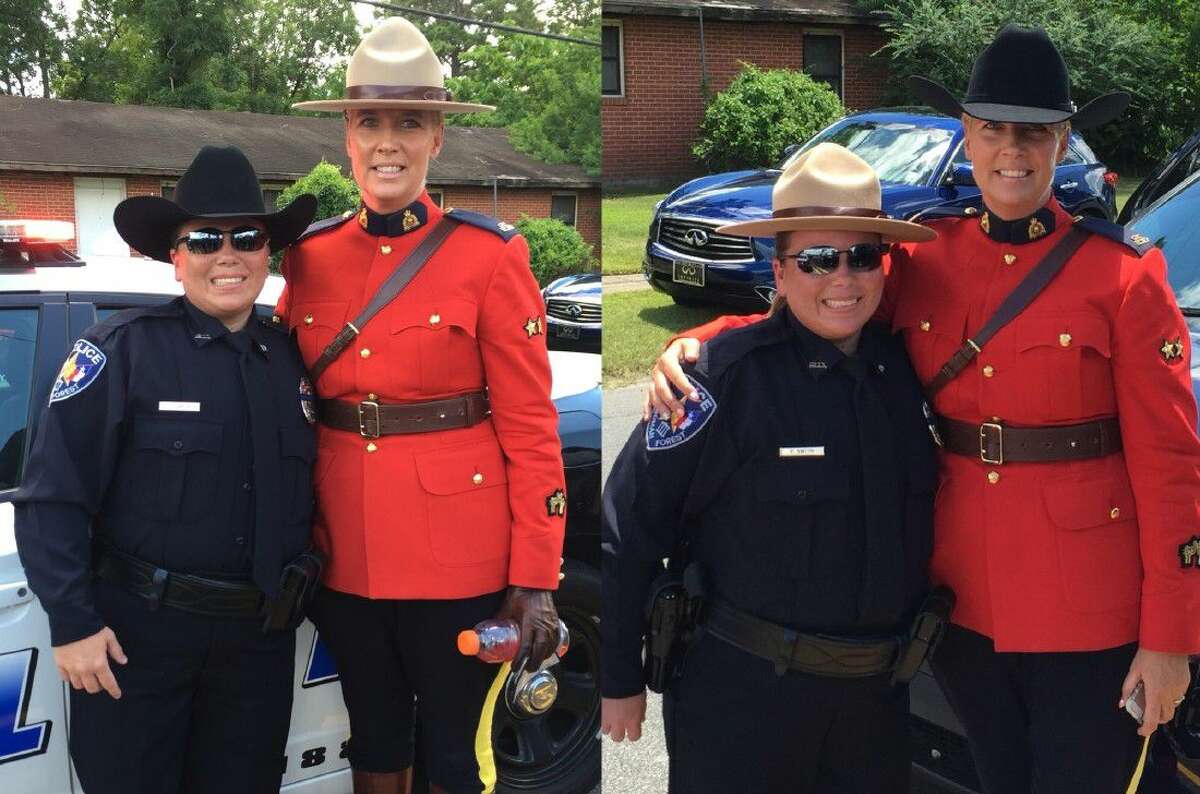 Roman Forest Police Officer Carmen Smith traded uniform hats with Royal Canadian Mounted Police Officer Sarah Wilkin.