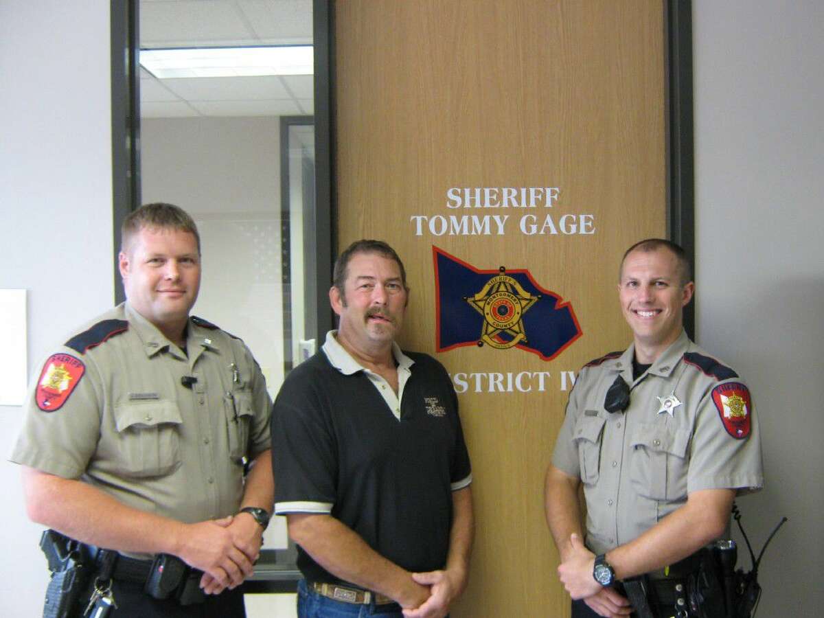Two Montgomery County Sheriff’s Office deputies were reunited with a man whose live they saved in March after responding to a welfare check call. Pictured from left are Deputy J. Erikson, William Wright of Magnolia and Deputy S. St. John.