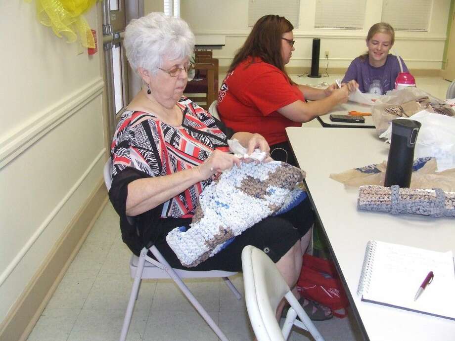 Tomball Group Helping Homeless By Crocheting Plastic Mats