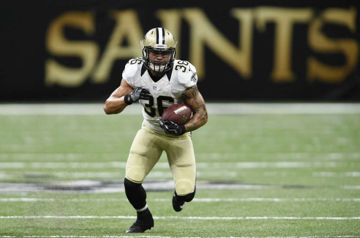 New Orleans Saints running back Daniel Lasco (36) runs against the Pittsburgh Steelers during the second half on Aug. 26. Lasco, a The Woodlands alum, made the Saints’ 53-man roster on Saturday.
