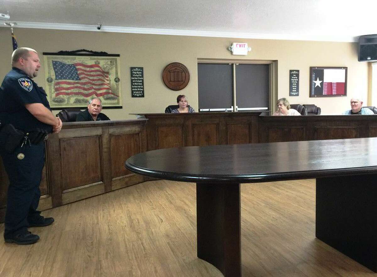 Roman Forest Police Chief Stephen Carlisle addresses the Public Utility District 3 board regarding the transfer of land for a new multi-use facility during a special meeting at Roman Forest City Hall Sept. 19.