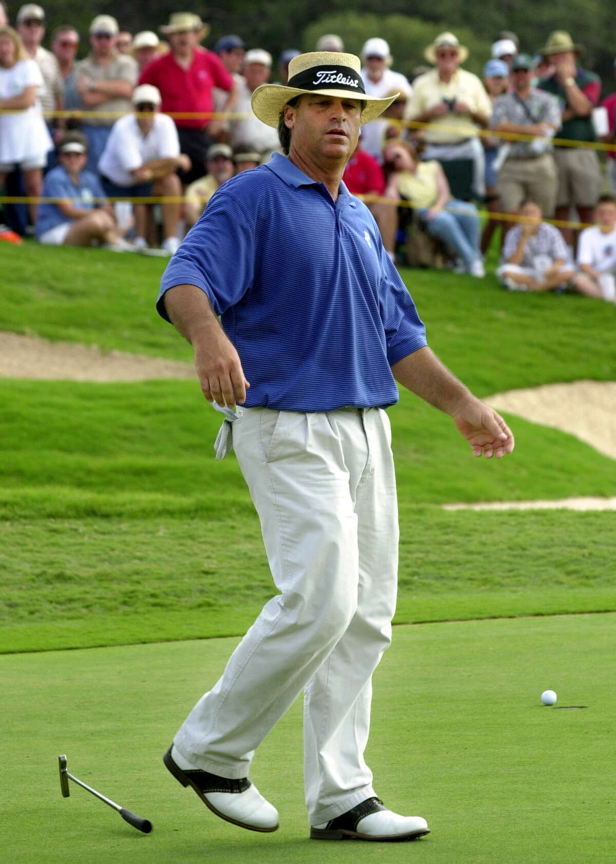 Blaine McCallister drops his putter after missing a birdie at the 18th green and the chance to break a tie for third place with Jim Gallagher Jr at the Westin Texas Open on Sept. 24, 2000.