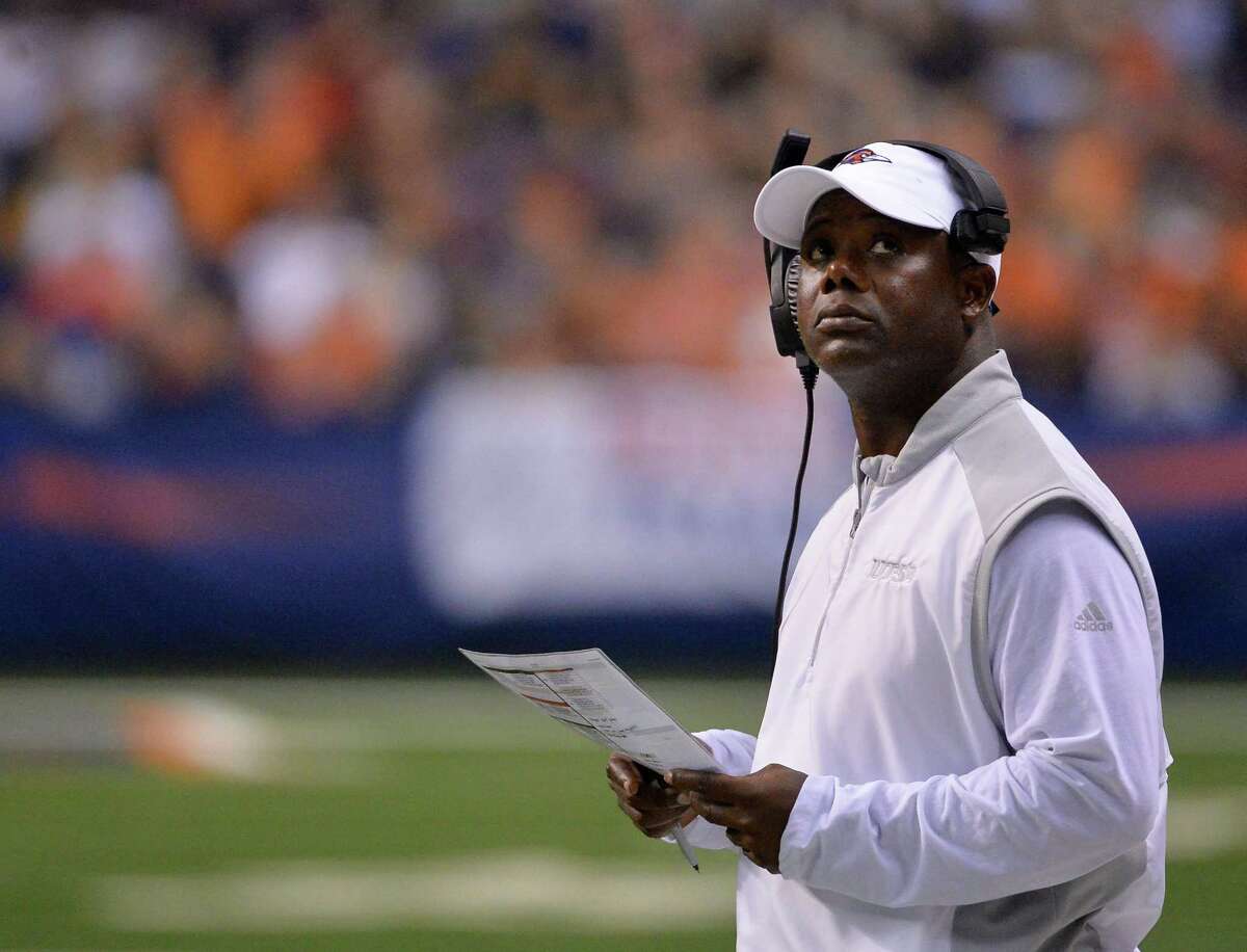 UTSA coach Frank Wilson looks at the scoreboard during the first half against Arizona State on Sept. 16, 2016, in San Antonio.