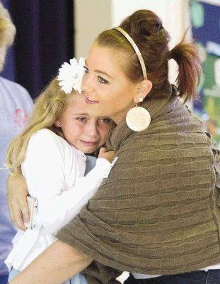 Ride Elementary school student saves mom’s life by calling 911