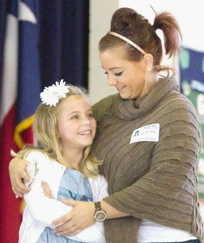 Ride Elementary school student saves mom’s life by calling 911