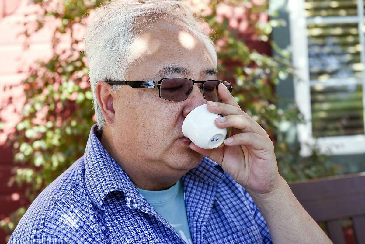 Roy Fong, owner of Imperial Tea Court, tastes a sip of Kumun black tea he freshly brewed, on his farm in Esparto, CA Thursday, October 6, 2016.