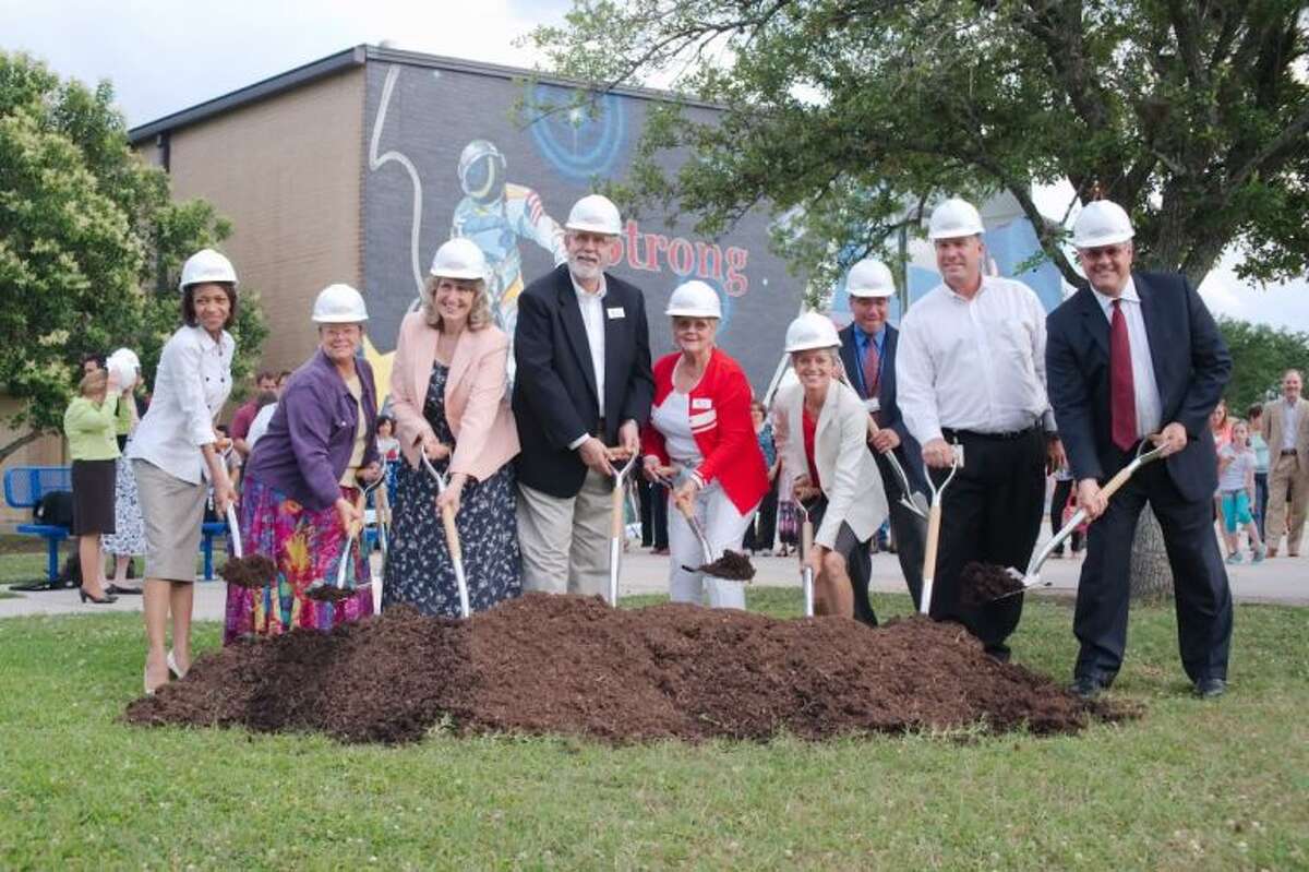 Clear Creek Independent School District board members ceremoniously break ground on the renovations to McWhirter Elementary during a ceremony Thursday, May 29.