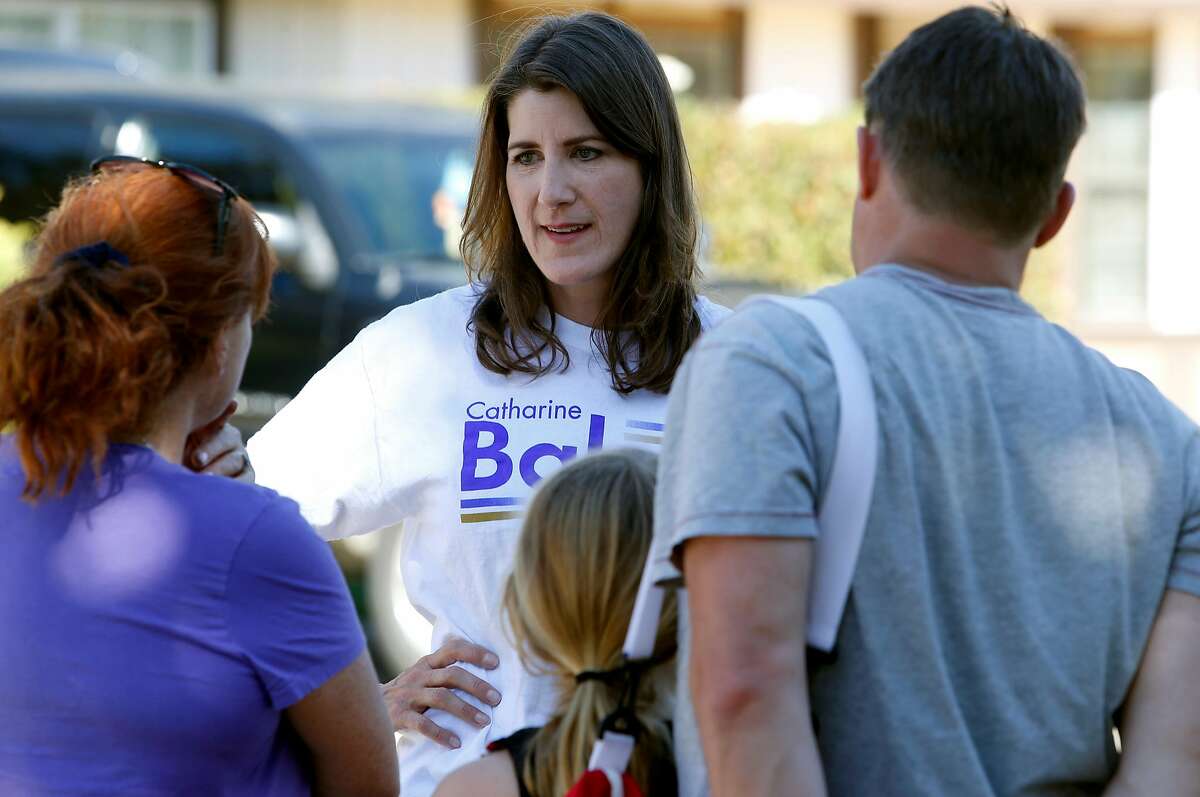 Republican Assemblywoman Catharine Baker meets Tina and Steven Wagner while canvassing for re-election to her District 16 seat in Pleasanton, Calif. on Saturday, Oct. 8, 2016.
