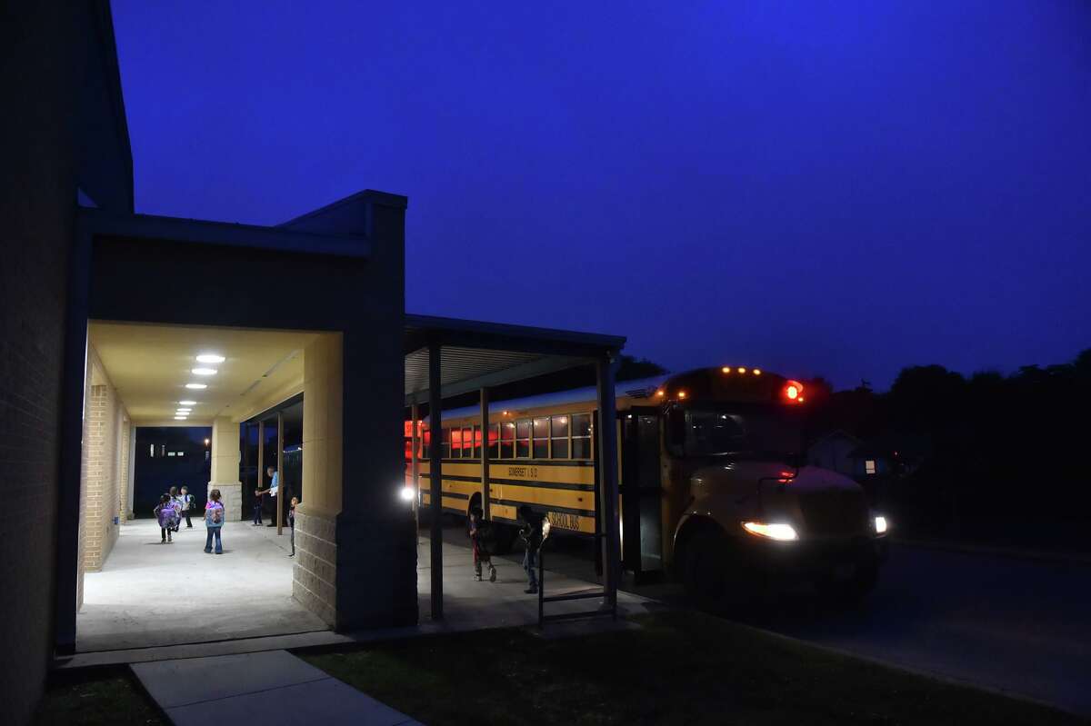 A Somerset ISD bus driver lets off a group of students at Somerset Elementary in this 2016 photo. Voters who live in the Somerset Independent School District will decide next week a $20 million bond to enhance school safety measures and construct a Fine Arts Center.