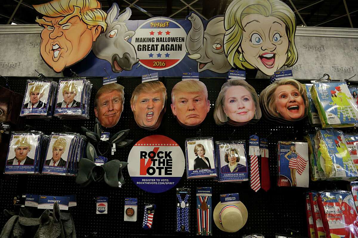 Presidential election costumes for sale at Spirit Halloween store Oct. 7, 2016, in Houston.