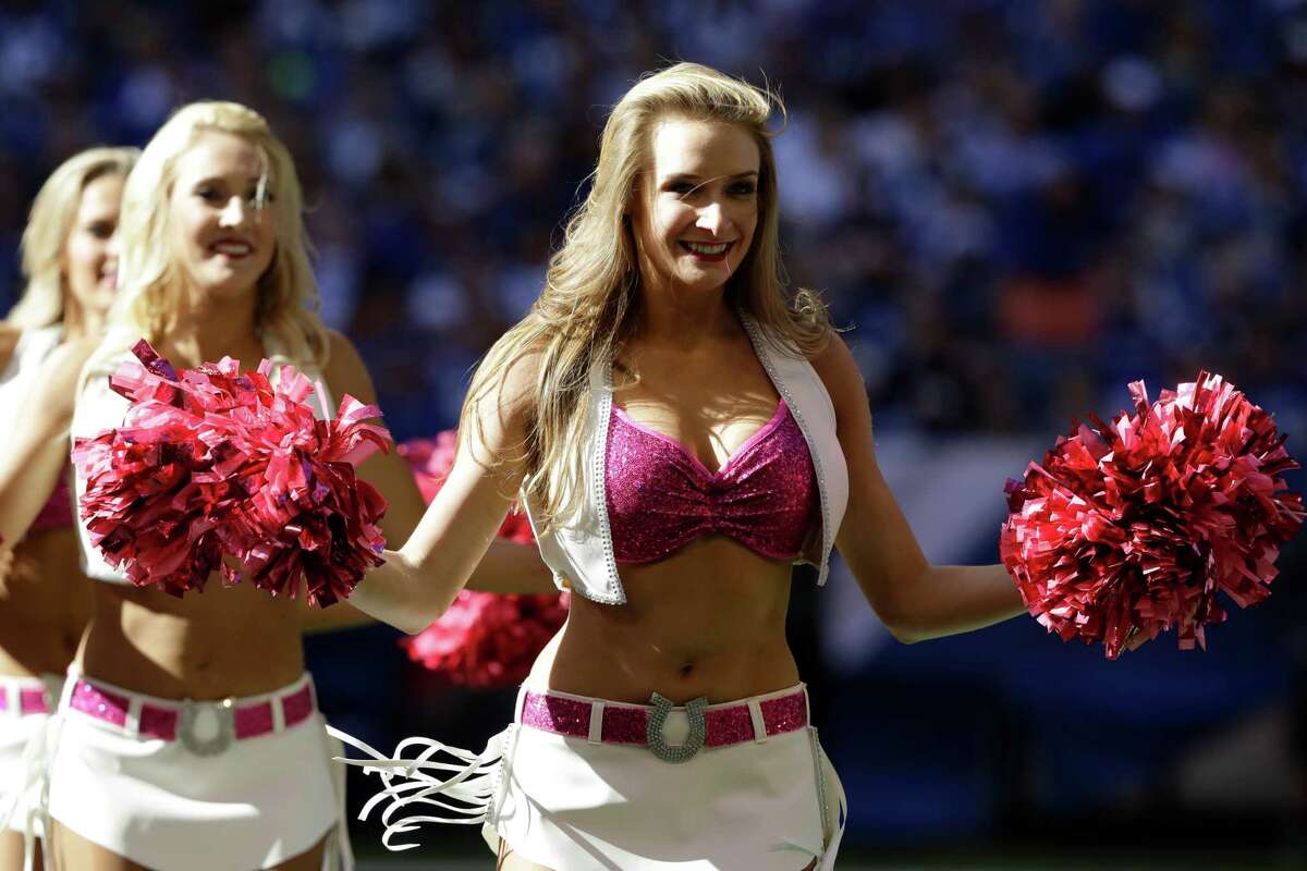 The Indianapolis Colts cheerleaders perform wear pink in support of Breast Cancer Awareness Month during the second half of an NFL football game between the Indianapolis Colts and the Chicago Bears in Indianapolis, Sunday, Oct. 9, 2016. (AP Photo/Darron Cummings)