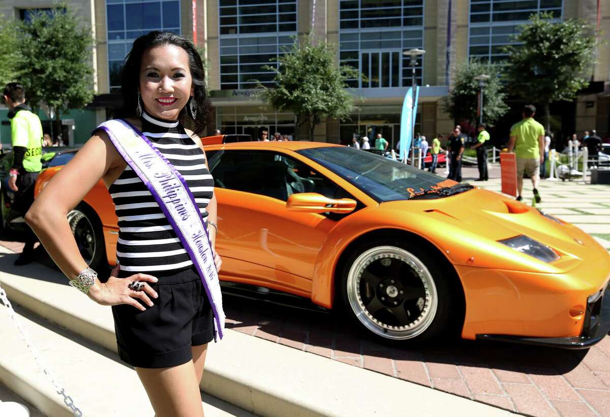 Miss Philippines-Houston 2016 Kaye Adan poses for a photo at Lamborghini Festival 2016 at Citycentre Plaza Sunday, Oct. 9, 2016, in Houston.