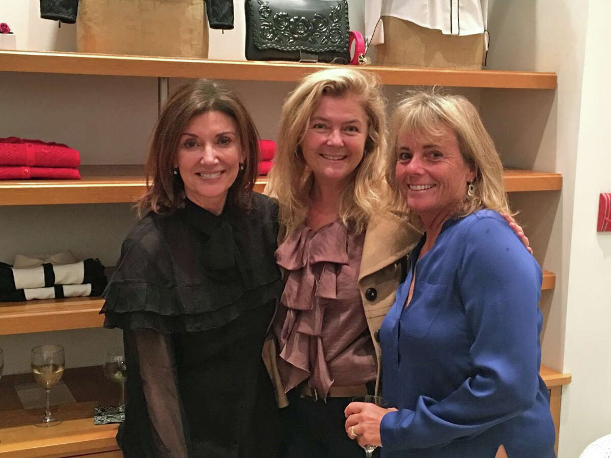 Ann Heekin, Executive Director of Don Bosco Community Center, poses with friends Kathy O’Brien (center) and Laurie Downs (right) during the Sept. 28 Anne Fontaine event. Heekin's black blouse is from the Anne Fontaine fall 2016 collection.