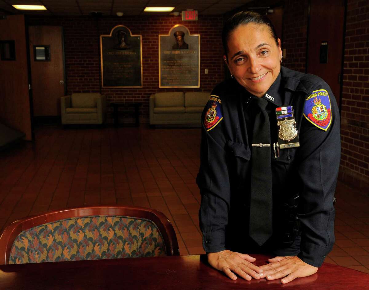 Stamford Police Investigator Adriana Molina has been named as Police Officer of the Year. Molina is photographed on Wednesday, Oct. 5 at the department headquarters in Stamford, Connecticut.
