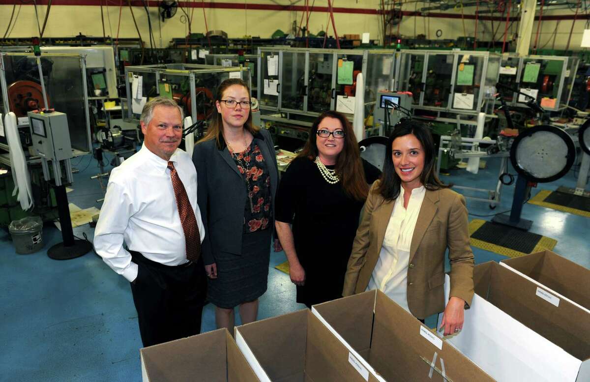 Bead Industries in Milford. From left to right is Chairman of the Board Ken Bryant, and his daughters: Database Manager Sylvia Pessin, Senior Marketing Manager Leah Davenport, and President Jill Mayer. Bead Industries is being inducted into the HCC American Manufacturing Hall of Fame.