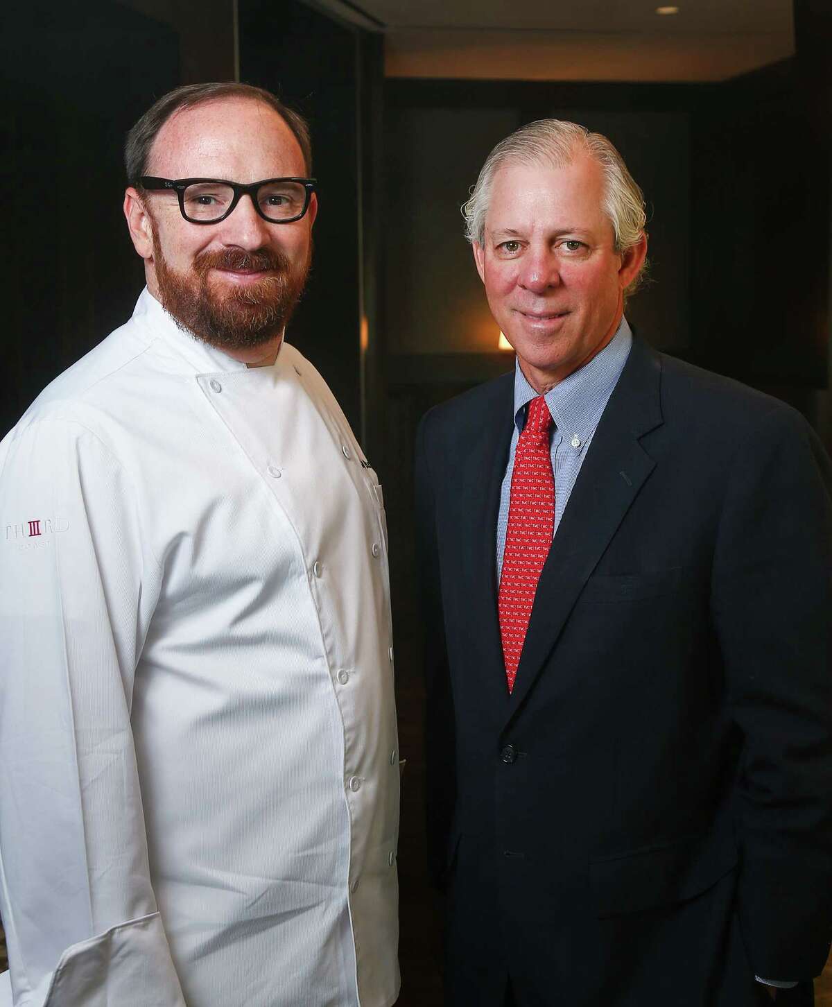 Chef Jon Buchanan, left, and Dr. Robert Robbins, president and CEO of the Texas Medical Center, pose for a portrait at Trevisio, Wednesday, Sept. 28, 2016, in Houston. ( Jon Shapley / Houston Chronicle )