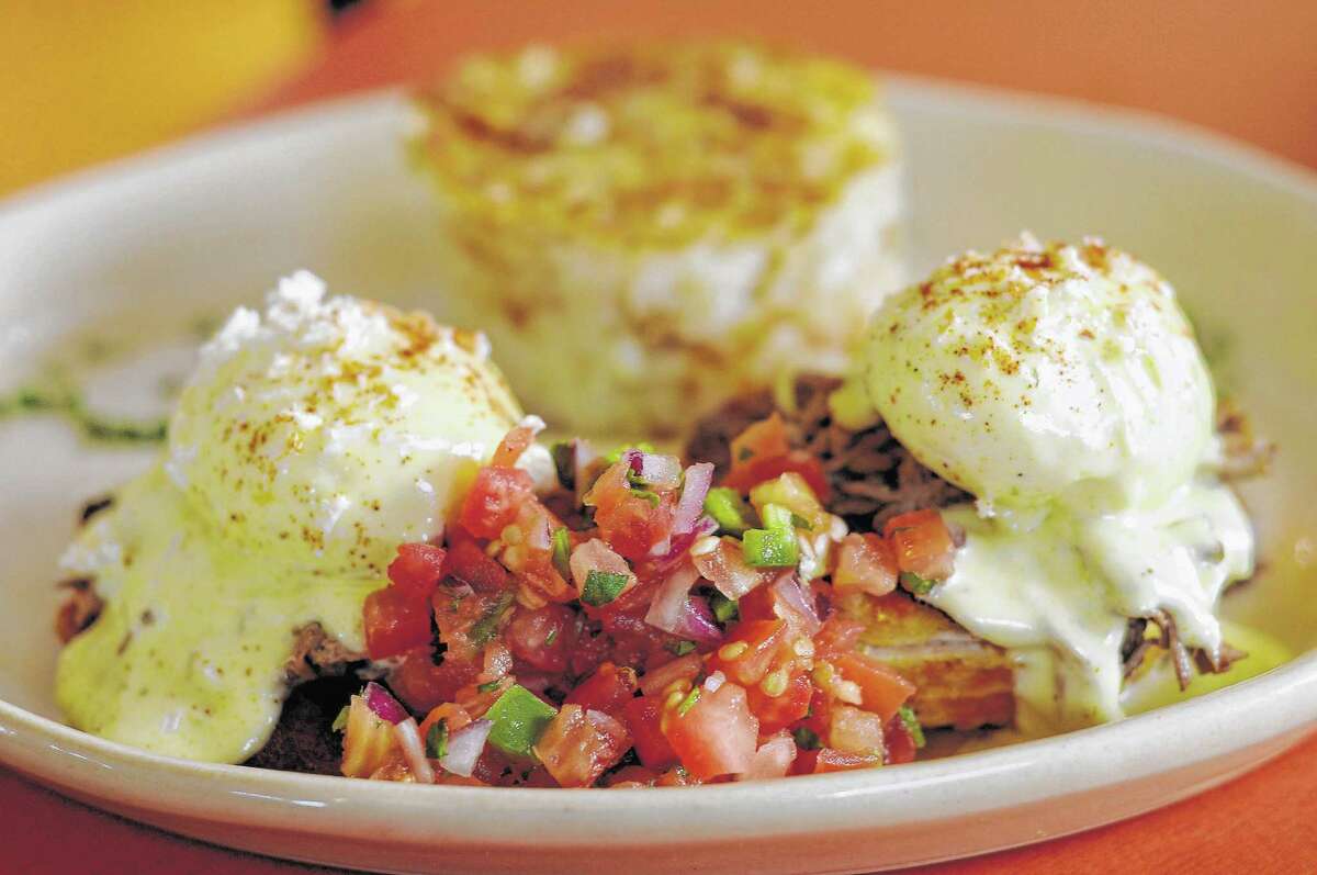 The Chilaquiles Benedict at Snooze on Montrose.