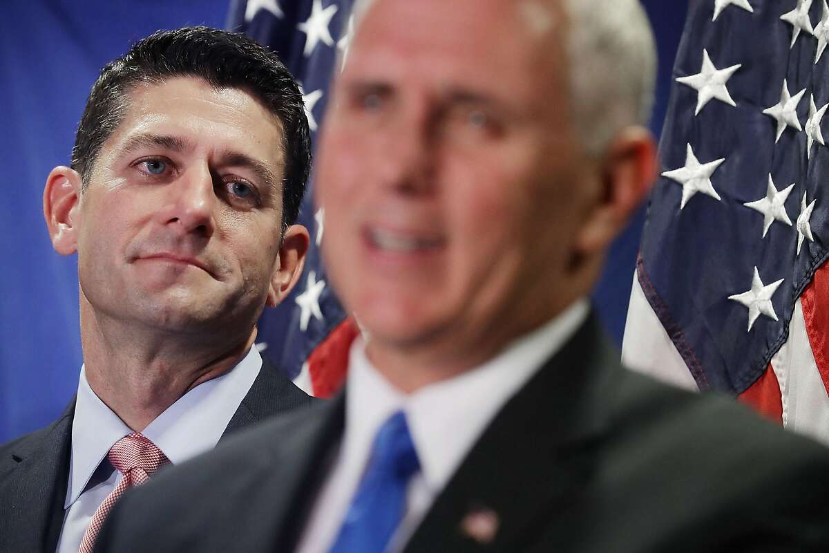 WASHINGTON, DC - SEPTEMBER 13: Speaker of the House Paul Ryan (R-WI) (L) listens to U.S. Republican vice presidental nominee Gov. Mike Pence during a news conference following a weekly House GOP conference at the Republican headquaters on Capitol Hill September 13, 2016 in Washington, DC. When asked about former vice presidential candidate Ryan's reluctance to endorse presidential candidate Donald Trump, Pence said that the House Republicans and the campaign agree on a plan for America. (Photo by Chip Somodevilla/Getty Images)