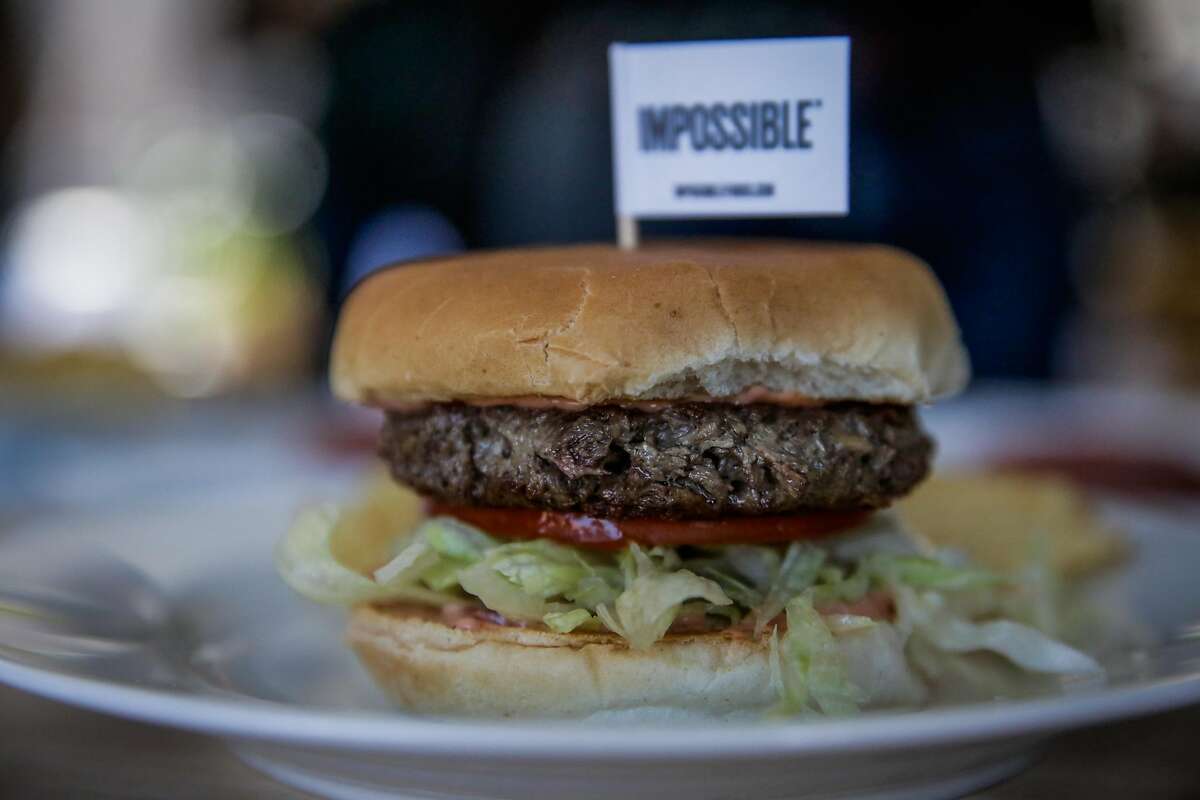 A non-meat burger made by Impossible Foods rests on a plate before being tasted, during a press event at the Impossible Foods headquarters in Redwood City, California, on Thursday, Oct. 6, 2016.