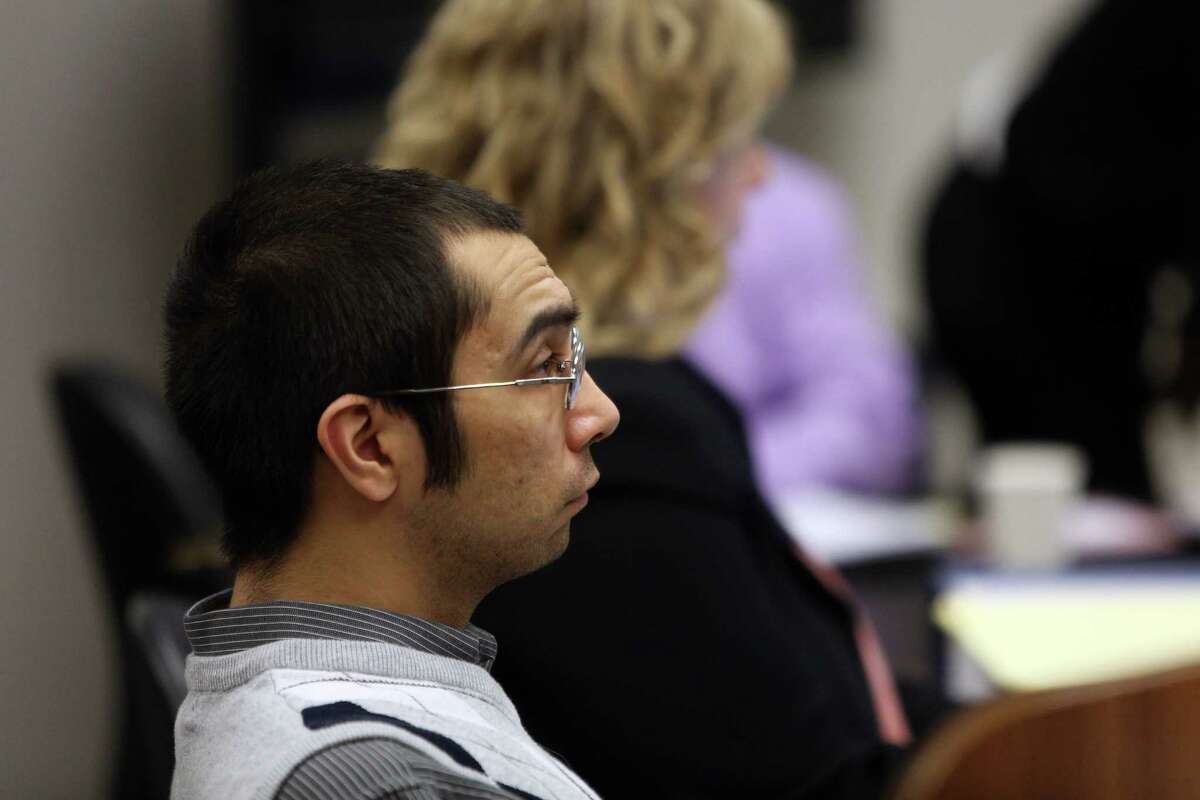 Aaron Ybarra listens in the courtroom on the first day of his trial for allegedly opening fire at Seattle Pacific University in June 2014, killing one victim Paul Lee and injuring two others, Oct. 10, 2016.