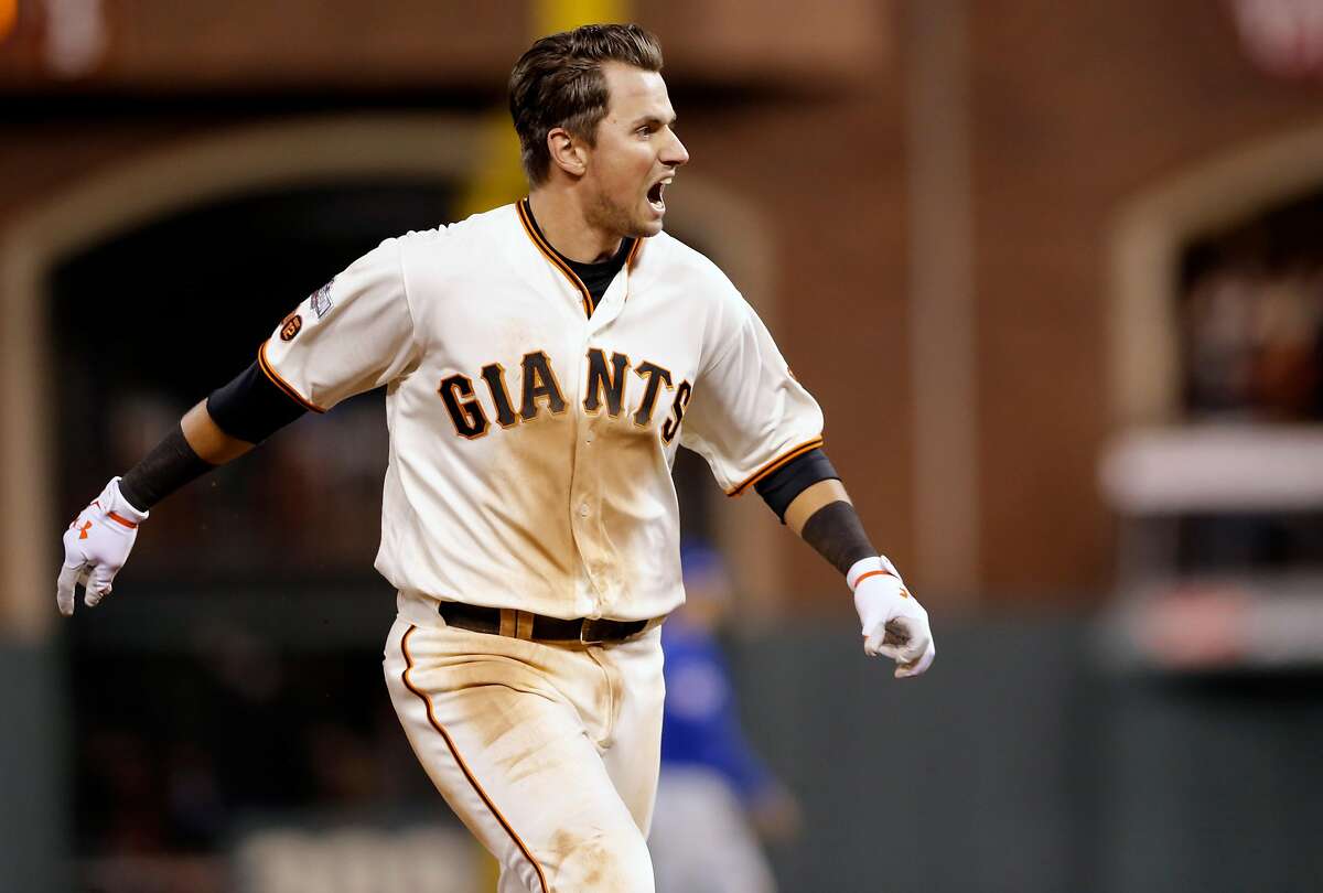 Giants' Joe Panik doubles in the winning run in the 13th inning as the San Francisco Giants beat the Chicago Cubs 6-5 in game 3 of the National League Division Series at AT& Park on Mon. Oct , 8 2016, in San Francisco, California.