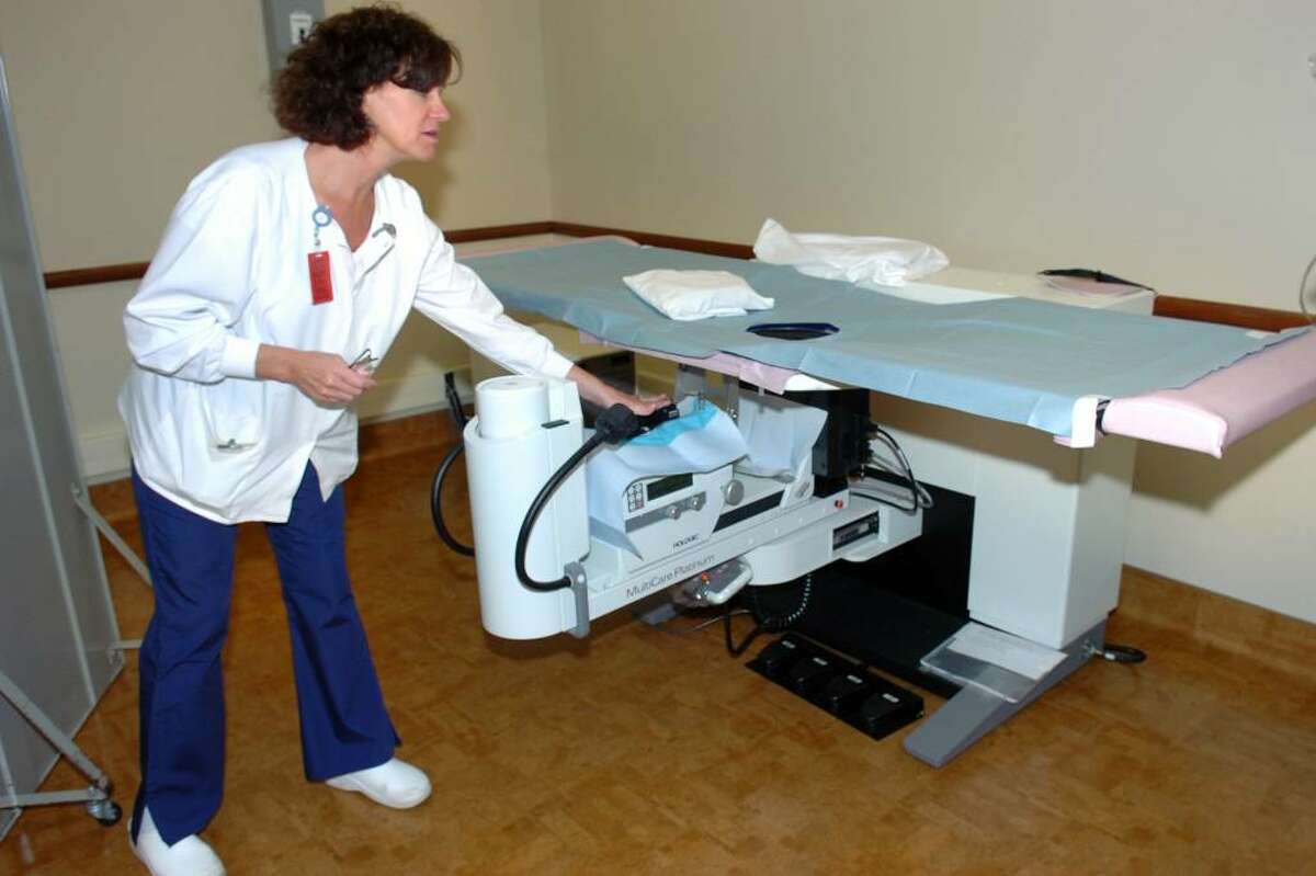Diane Vanacore, a Radiologic Technologist, shows a new stereotactic core biopsy unit in the Norma F. Pfriem Cancer Institute's new Mammography Suite, at Bridgeport Hospital, May 10th, 2010.