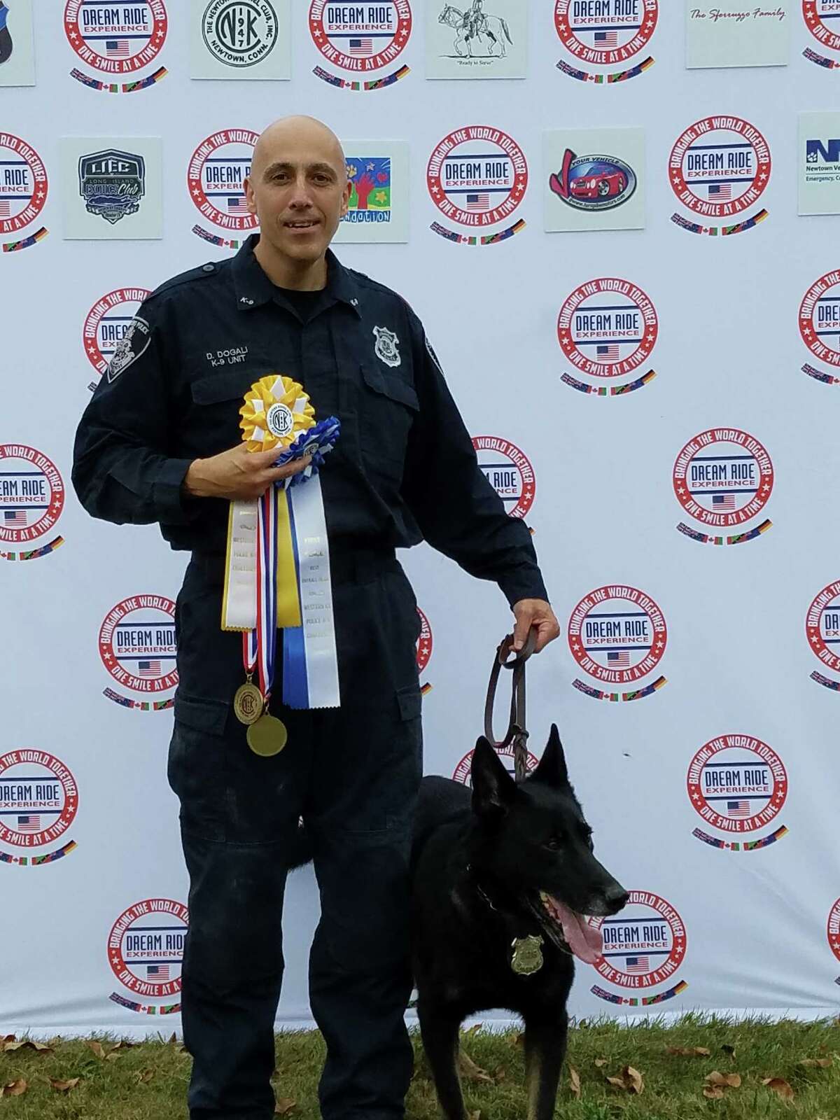 Officer David Dogali and K-9 Bobi win top awards at Western Connecticut K-9 Challenge over the past weekend.