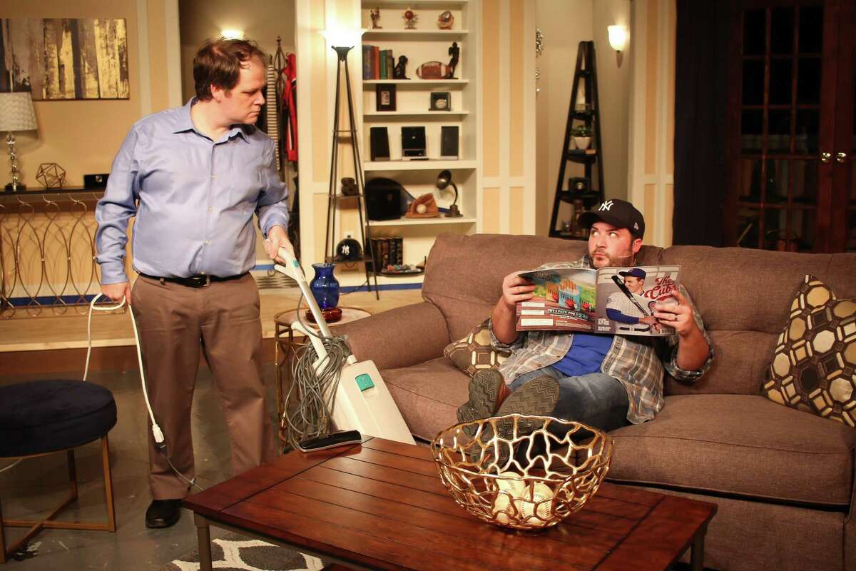 David Eck, left, portrays neat freak Felix Ungar, and Chad McCallon plays slob Oscar Madison in Art Park Players' production of "The Odd Couple."