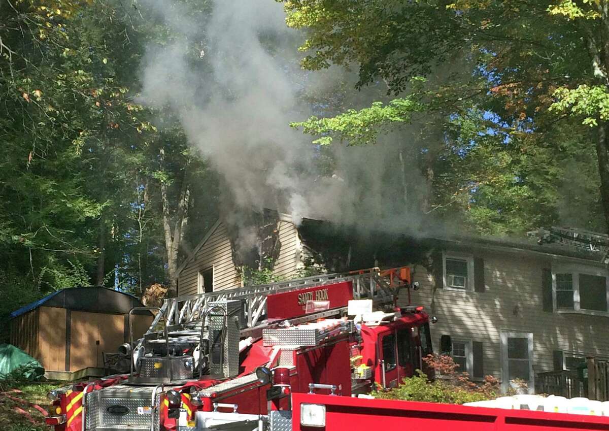 Firefighters knock down Newtown house fire