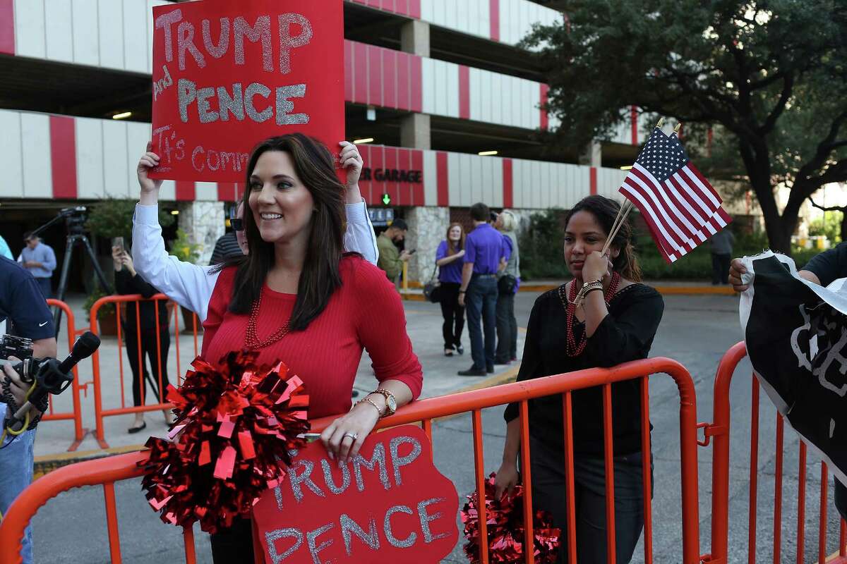 Ashley Jeneby, left, and Ashley Villarreal hang out by the Grand Hyatt Hotel, Tuesday, Oct. 11, 2016. Republican presidential nominee Donald Trump attended a fundraiser at the hotel.