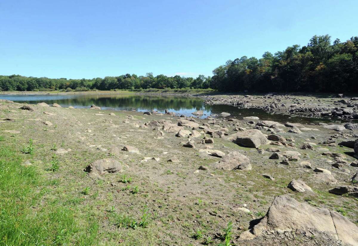 The depleted water reservoir off of North Street in Greenwich, Conn., Thursday, Sept. 22, 2016. First Selectman Peter Tesei and the Board of Selectmen have enacted an existing town ordinance for water conservation measures preventing people from using irrigation systems to water their lawns due to drought condtions. Aquarion, the water company serving Greenwich, has put in mandatory water restrictions for Greenwich and other communities last week.